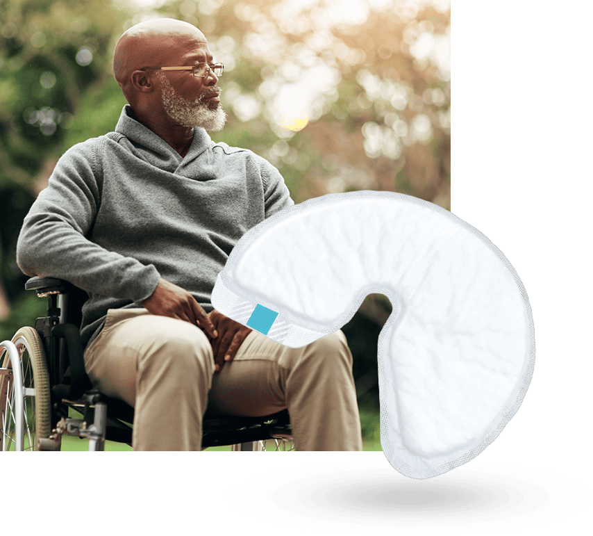 Man in a wheelchair with a QuickChange Wrap overlay